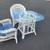White wicker table with glass top and 2 chairs 1 thumbnail