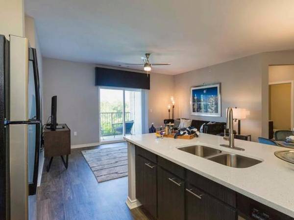 $1,745 / 2br - 1109ft2 - Sunroom, Built in Desk with Shelving Above (North Colorado Springs)63686763660803120