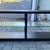 Steel and glass TV stand console table, solidly built 1 thumbnail
