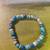 beaded stretch bracelet featuring blue grey stone beads turquoise or blue jade 1 thumbnail