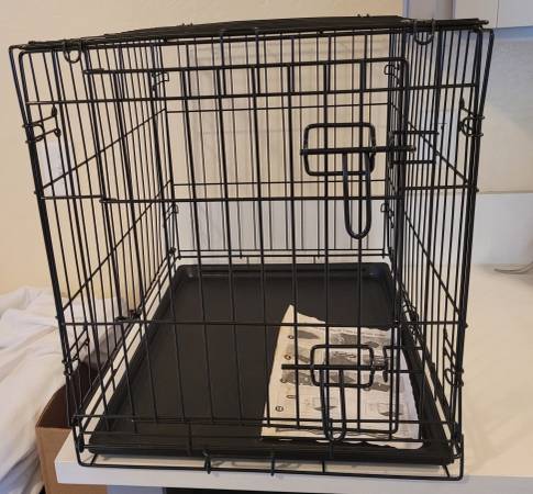 BARTAR WANTED: Medium size wire pet crate for smaller size 1
