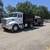 Dump truck and bobcat and concrete 1 thumbnail
