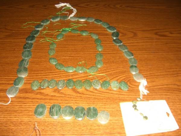 faceted and holed stone/jade pieces from a necklace 1