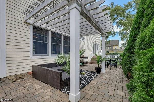 Charming Colonial: Spacious Corner Lot, Inviting Front Porch, Finished Basement 1