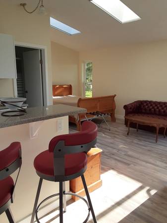 Ocean suite on strait Otterpoint Beach House Rainbow Suite 1