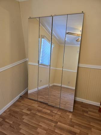Set of two 24"x78" mirrored bi fold doors like new with hardware 1