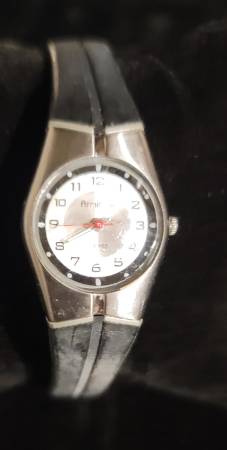 Ladies Silver Tone Bezel With Black And Silver Tone Dial Armitron Quar 1