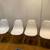 4 plastic chairs with wooden eiffel tower base legs, 4 in total 1 thumbnail