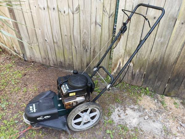 CRAFTSMAN 22'' WHEELED STRING TRIMMER / READ BELOW 1
