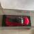 New in box - Tesla exclusive - 1:43 Diecast model of red Tesla Model 3 4 thumbnail