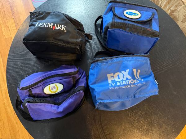 Four Lunch Bags Featuring Company Logos 1