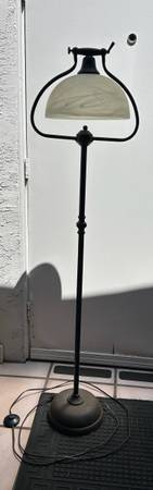 Elegant floor lamp with a unique decorative glass shade. vintage industrial dark 1