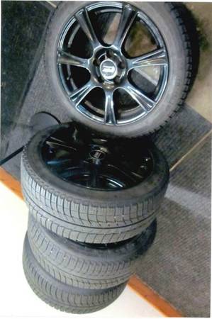 4 snow tires and wheels 1