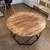 Brown and Black Mango Wood Round Coffee Table with Geometric Design Open Iron Ba 2 thumbnail