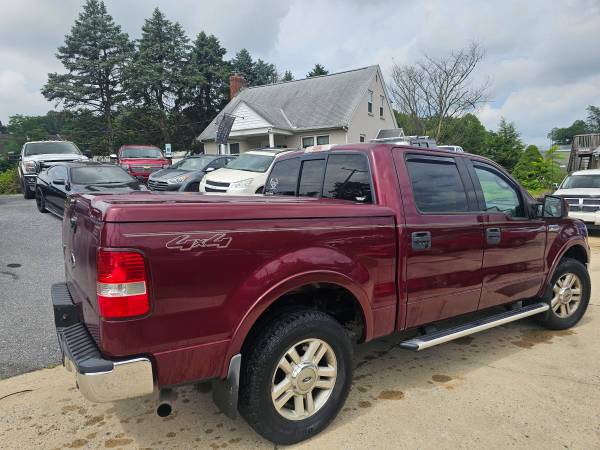 2004 ford f150 lariat 4x4 - $4,99563613640071555124