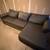 Grey sectional couch with pull out bed 1 thumbnail