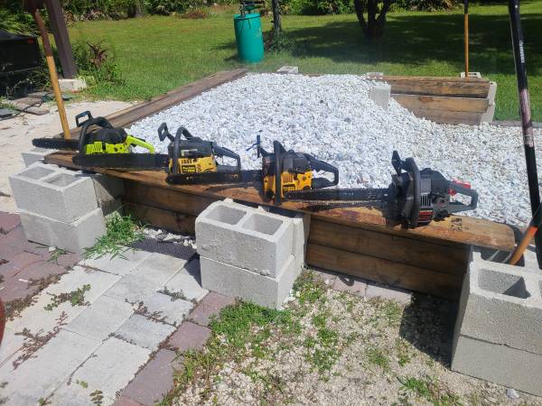 Chainsaws needing tlc....No they arent destroyed, just dont run steady 1