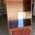 Cherry curio cabinet with working light inside. It measures about 23-1 7 thumbnail