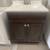 24.5"W x 33"T x 18.5"D Dark Brown Bathroom Vanity White Top Used 2 thumbnail