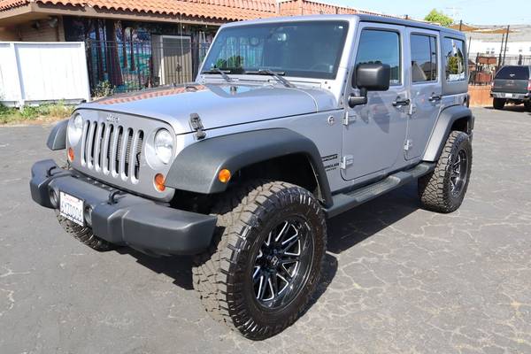 2013 Jeep Wrangler Unlimited Sport Low Miles Automatic New Wheels and Tires - $19,900 (santa cruz)63486850849281122