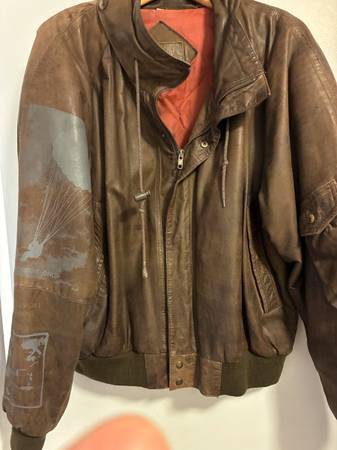 40+year old Chia leather bomber jacket with parachute insignia 1