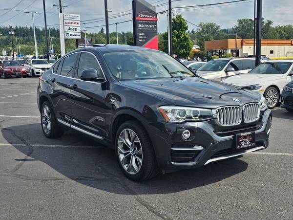 2016 BMW X4 xDrive28i - $19,850 (Lujo de segunda mano)63442170775043122