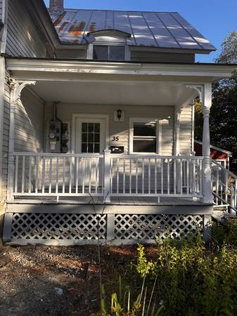 Two bedroom, one bathroom, apartment near schools with yard 1