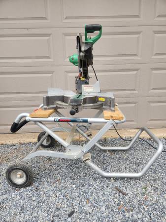 Hitachi C12FDH 12” Compound Miter Saw W/ Bosch TS3100 gravity rise table. 1