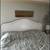 Like new White wicker king size unattached headboard 1 thumbnail