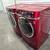Like New - GE MEGA CAPACITY Steam Front Load Washer Gas Dryer in Red 3 thumbnail