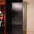 6 ft tall black lovely cabinet with glass shelves and light 3 thumbnail