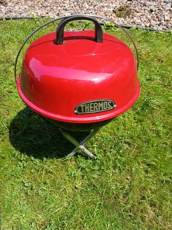 Portable charcoal grill. 1