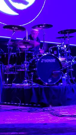 DRUMMER LOOKING 1