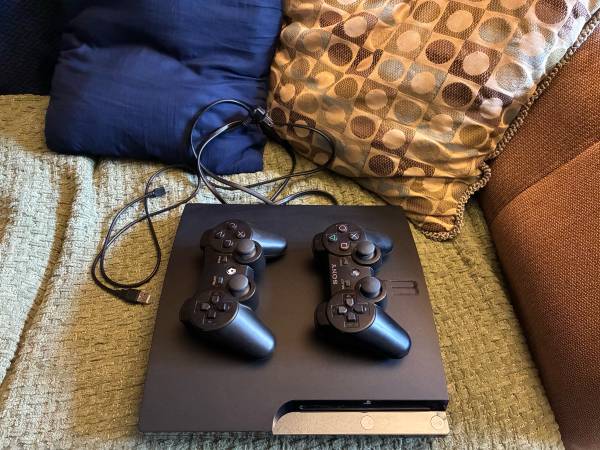Sony PlayStation 3 Slim (CECH-2001A) – 2 Controllers Included - $120 (Corvallis)