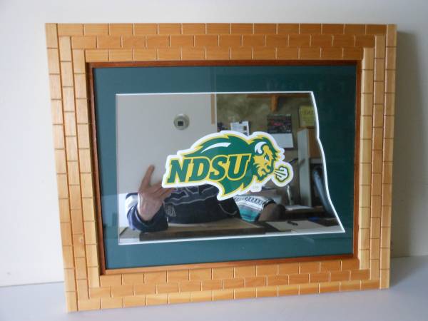 #280  North Dakota state cutout with NDSU logo on a framed mirror 1