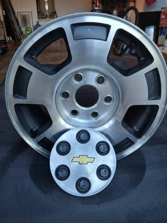 4 chevy 17x8 6 lug wheels with caps 1