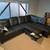 Black L-shaped sofa with storage ottoman 1 thumbnail