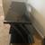 Sleek black glass TV Stand (almost new) 2 thumbnail