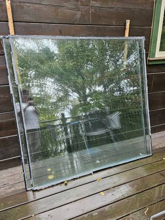 2 tempered glass 5' x 5' picture windows 1