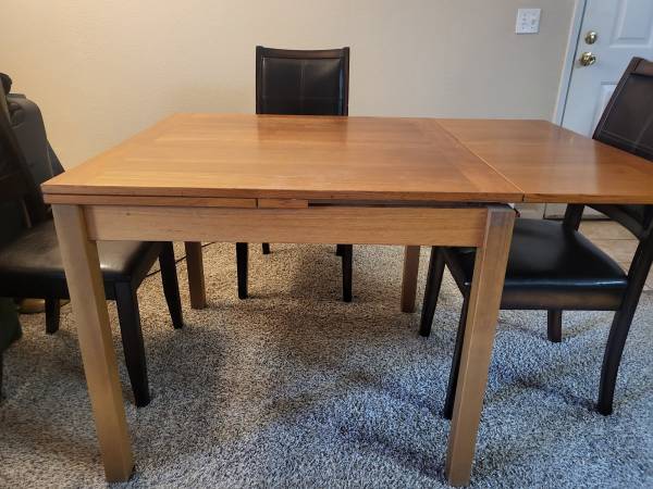 Extendable Dining Table with 4 Black Chairs 1