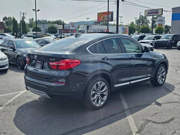 2016 BMW X4 xDrive28i - $19,850 (Lujo de segunda mano)63442170775043124