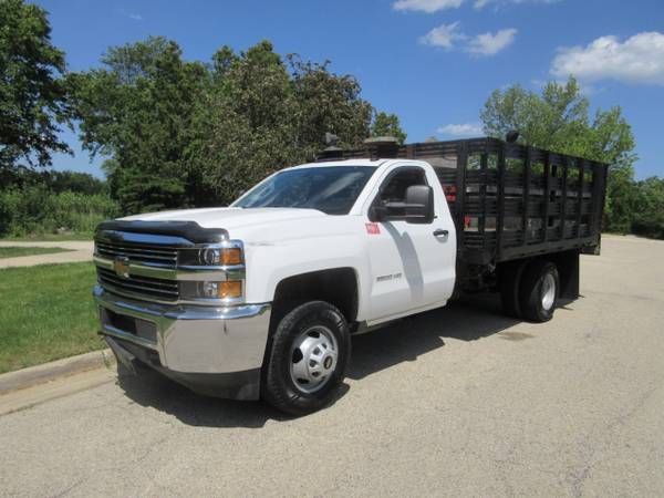 2016 Chevrolet Silverado 3500HD STAKE BODY FLAT BED - LIFTGATE - $15,875 (HIGHLAND PARK)63517767551619121