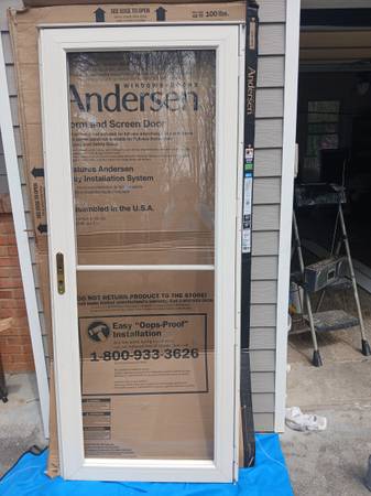 Andersen Storm Door. 32*80 Almond 1