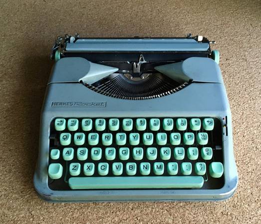Vintage 1960 Hermes Rocket Typewriter with Lid and Instruction Manual 1