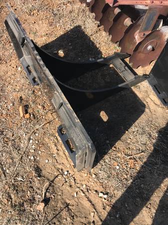 Skid steer rock digger 1