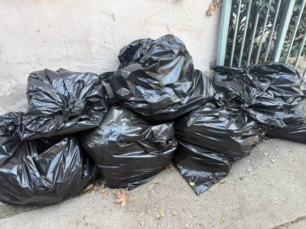 4 bags of mixed trash and recycling 1