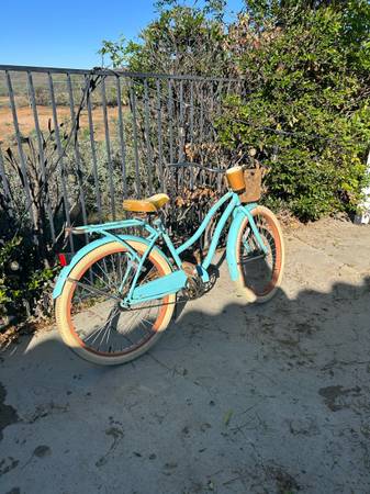 Teal blue and tan Huffy beach cruiser 1