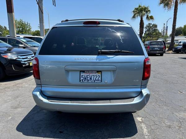 2005 Dodge Grand Caravan SE - $3,99563619519333889123