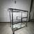 White couch, green bed frame, nightstands, bar cart and lamps 5 thumbnail