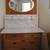 120 year old wood vanity, 4 drawers with mirror and marble top 1 thumbnail